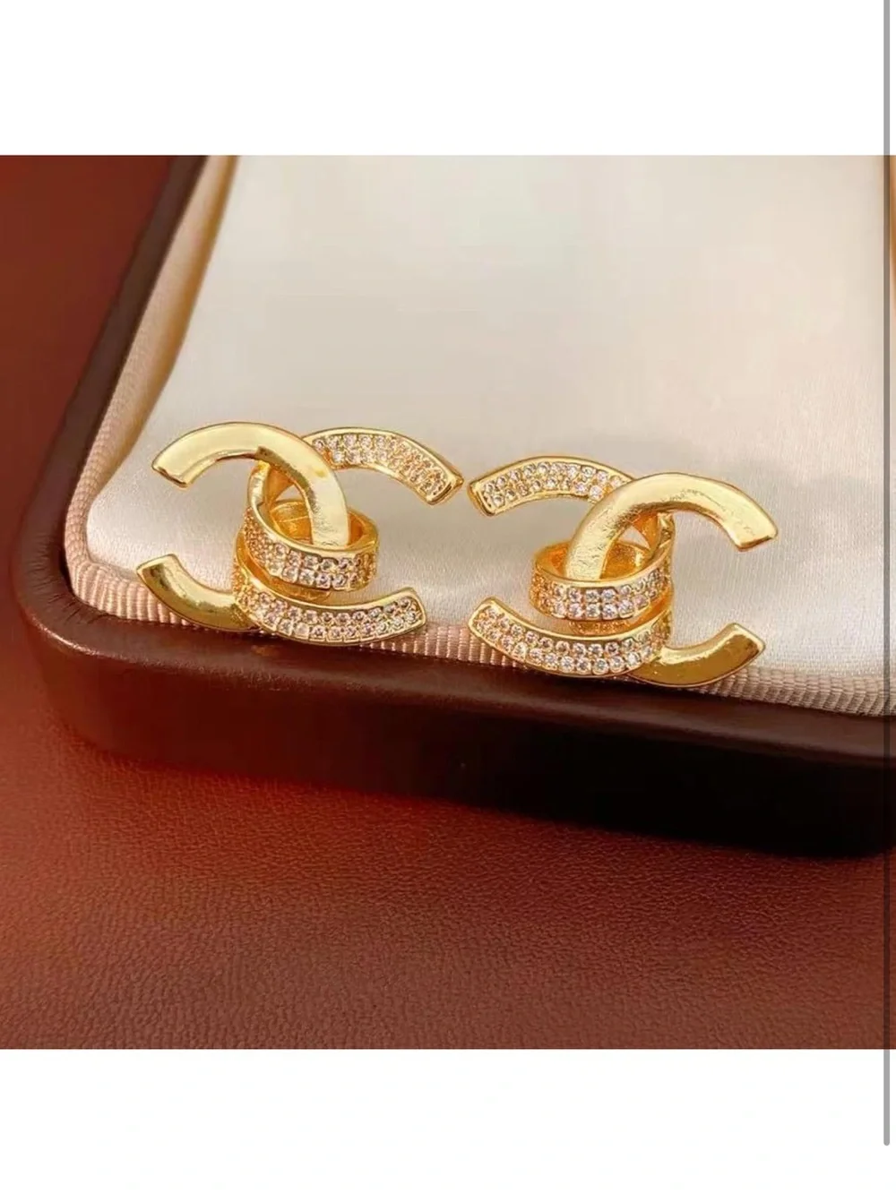 Gold Interlocking Crystal Stud Earrings – Elegant Luxury Statement Earrings